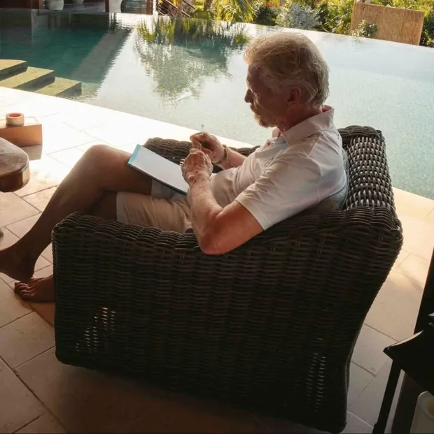 writing by the pool &middot; Necker Island